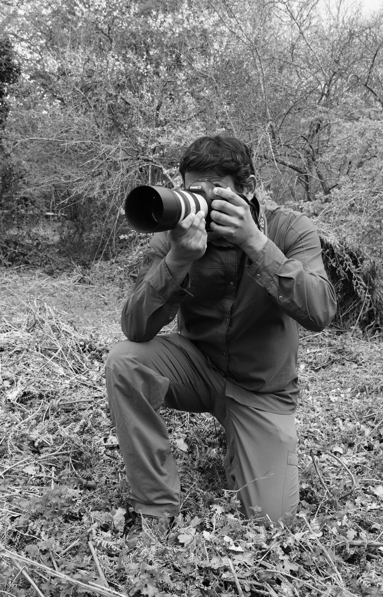 Raj Joshi at work in the field with a camera